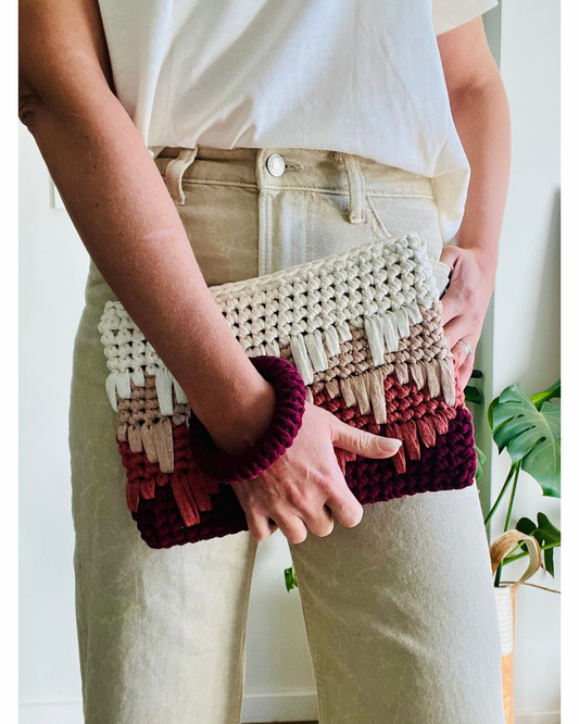 Our Spearhead Bangle Clutch in our signature eco-friendly yarn, features a built-in crochet bangle.